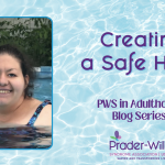 An adult with Prader-Willi Syndrome poses mid-swim in a pool