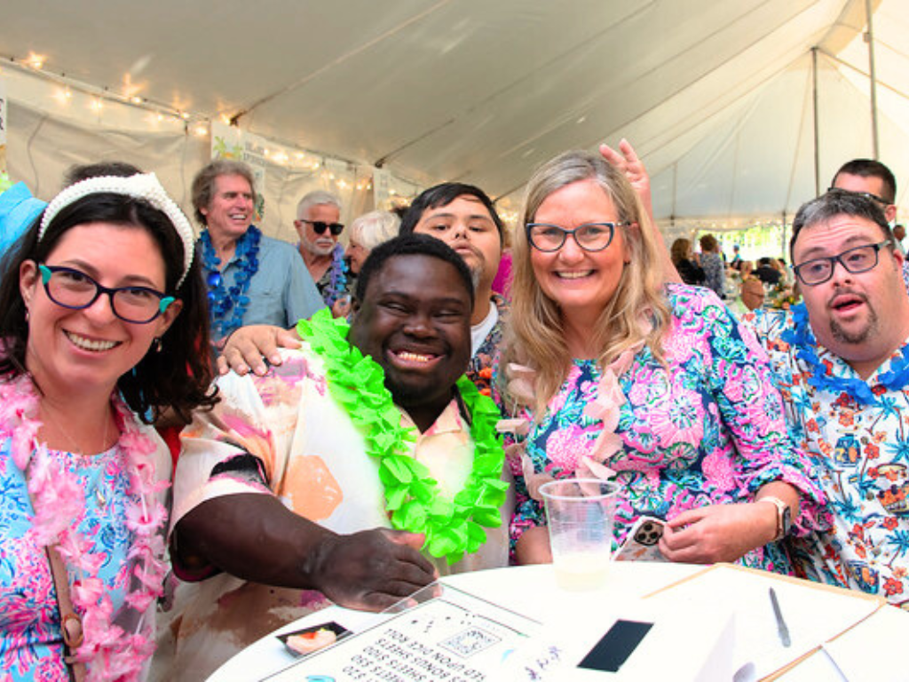 Group of Individuals with Prader Willi Syndrome Celebrating